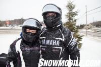 Ice Covered Snowmobilers